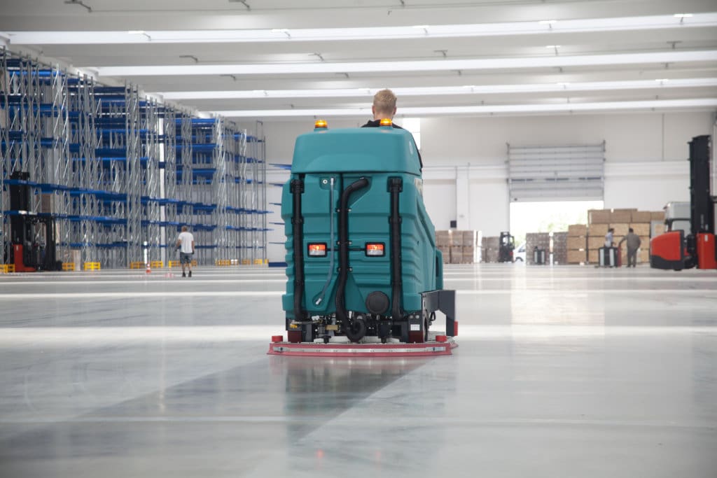 How To Clean A Warehouse With A Ride-On Sweeper